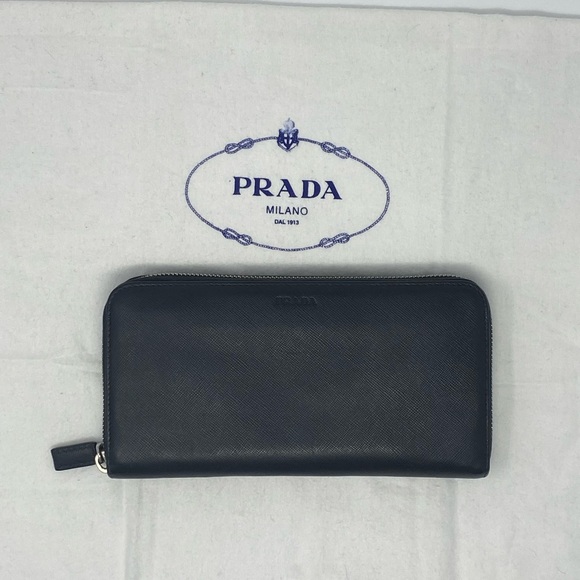 Prada Handbags - Like New AUTHENTIC Prada Saffiano
Leather Black Long Zippy Wallet w/box  $699